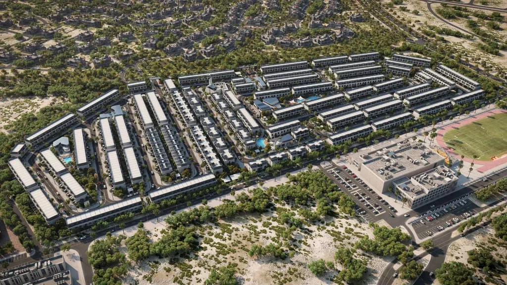 The whole Taormina Village masterplan from above, rows of homes laid out around green space