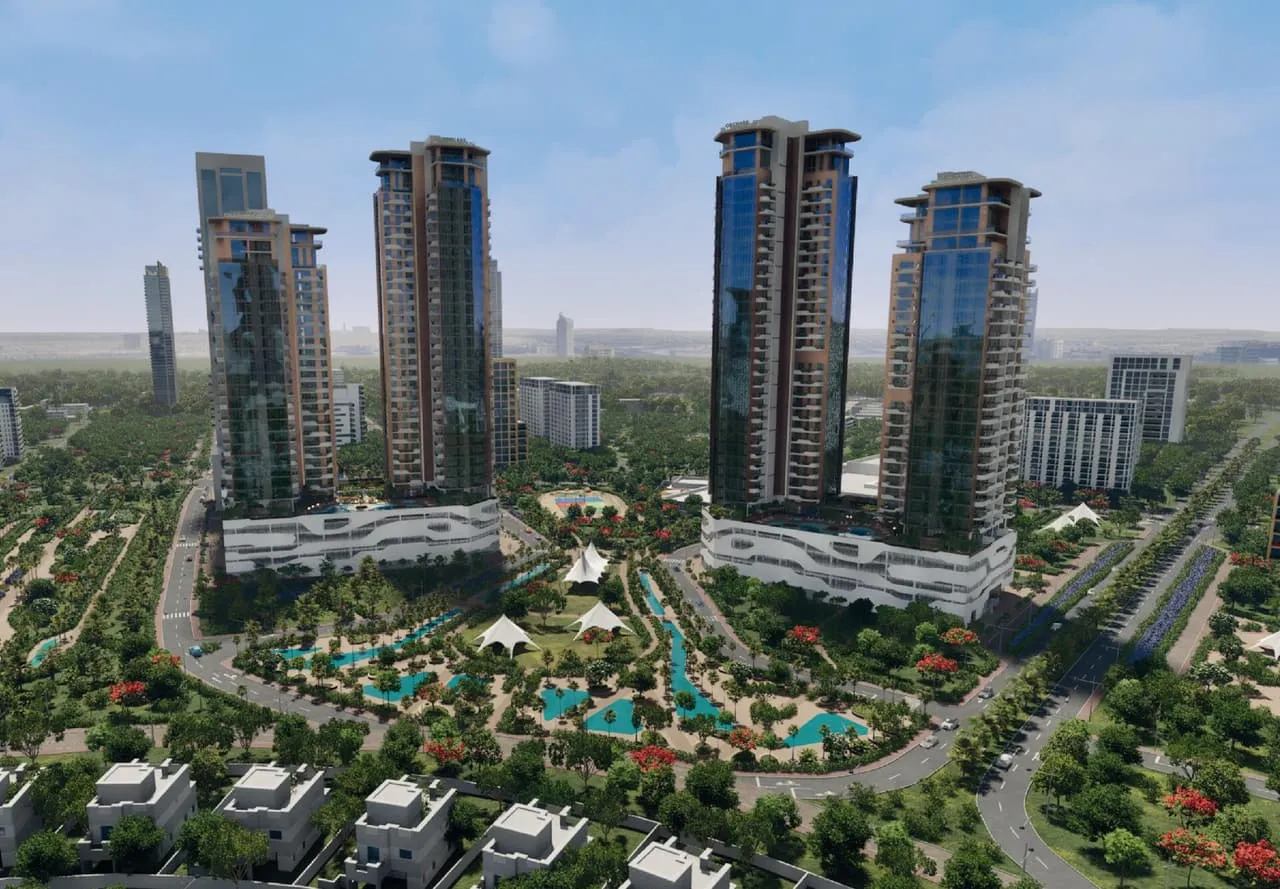 Seen from above, the towers rising over the low-rise streets, pools and gardens of the surrounding district