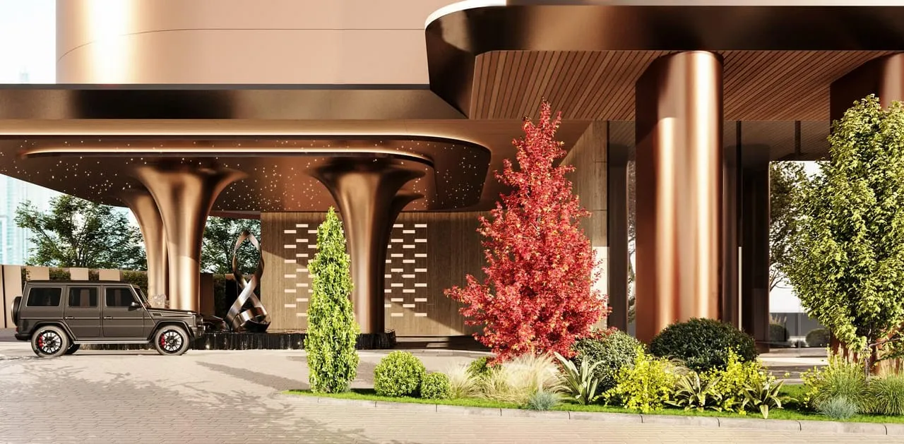 The arrival court of a Dubai residential building, a car waiting at the door
