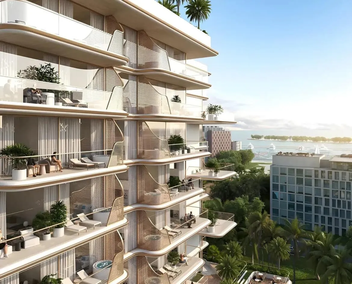 A close view of the balcony stack, deep terraces shaded by planting with a neighbouring block behind