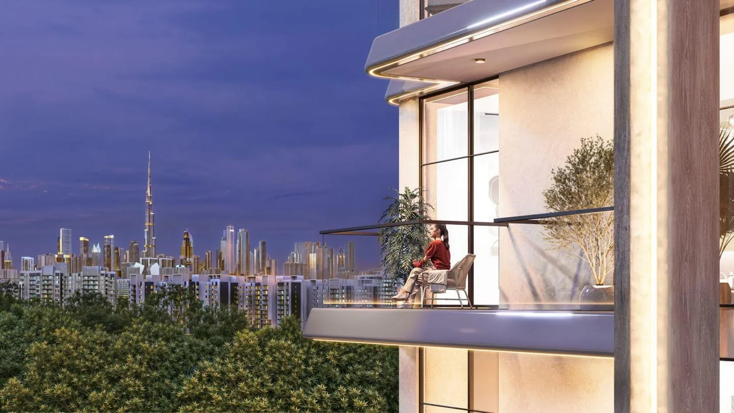 From a balcony at dusk, the Downtown skyline and Burj Khalifa beyond the glass rail