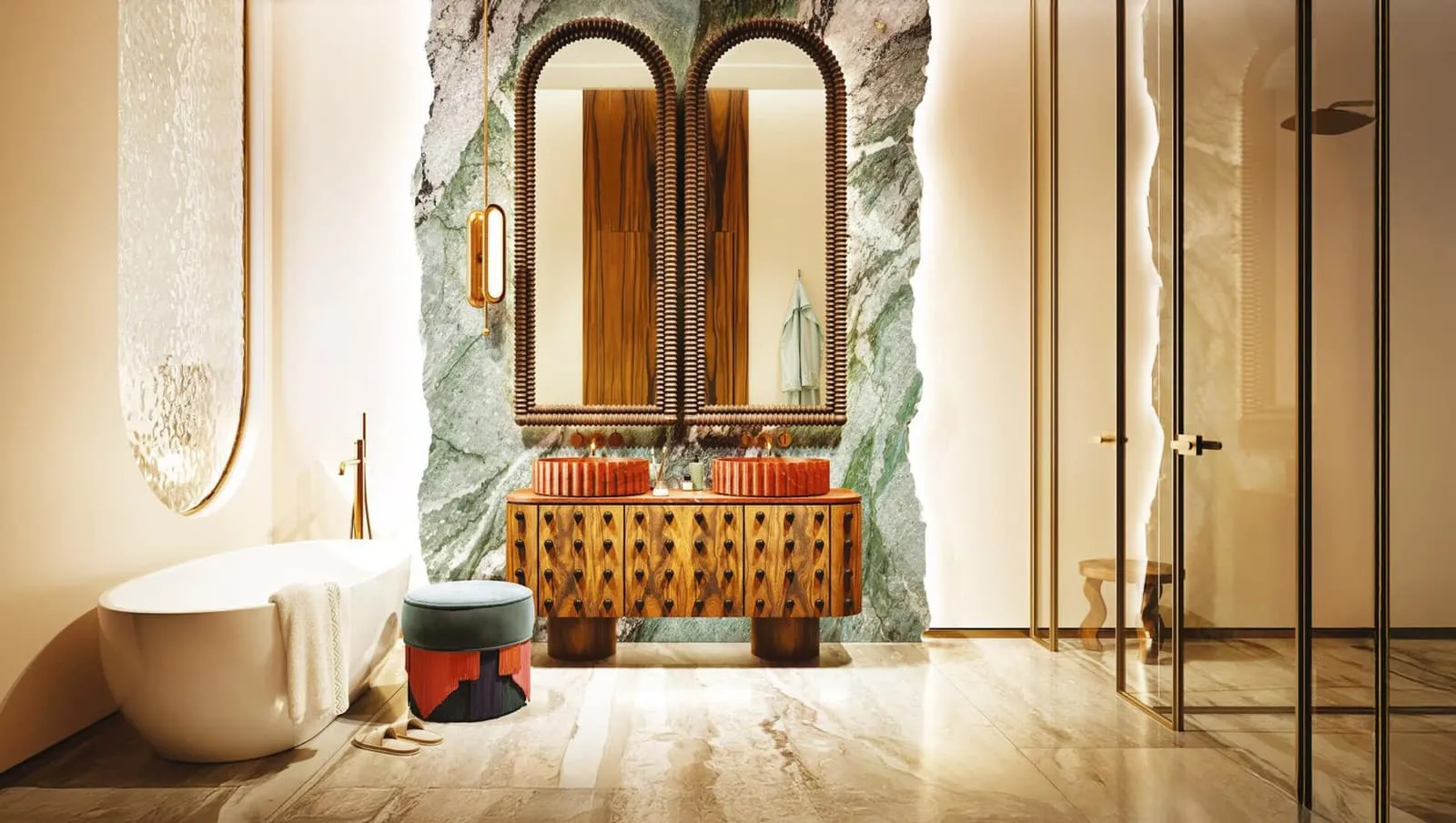 A bathroom with a freestanding tub, an arched mirror above a stone vanity and a veined stone wall behind