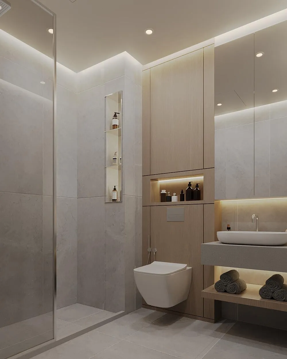 A bathroom with a walk-in shower behind clear glass and a full height stone surround