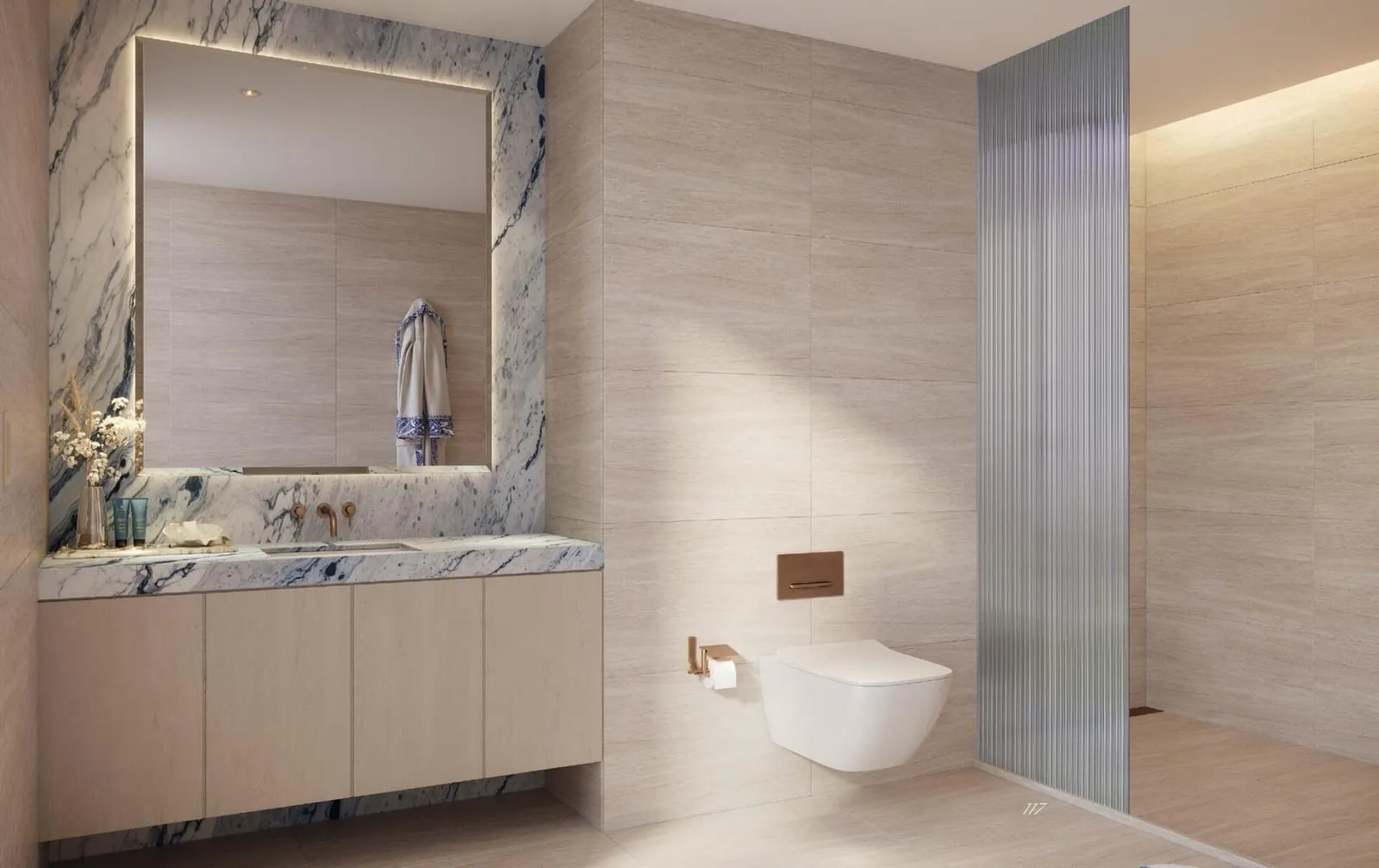 A bathroom with a veined stone vanity, a backlit mirror and a fluted glass screen at the shower