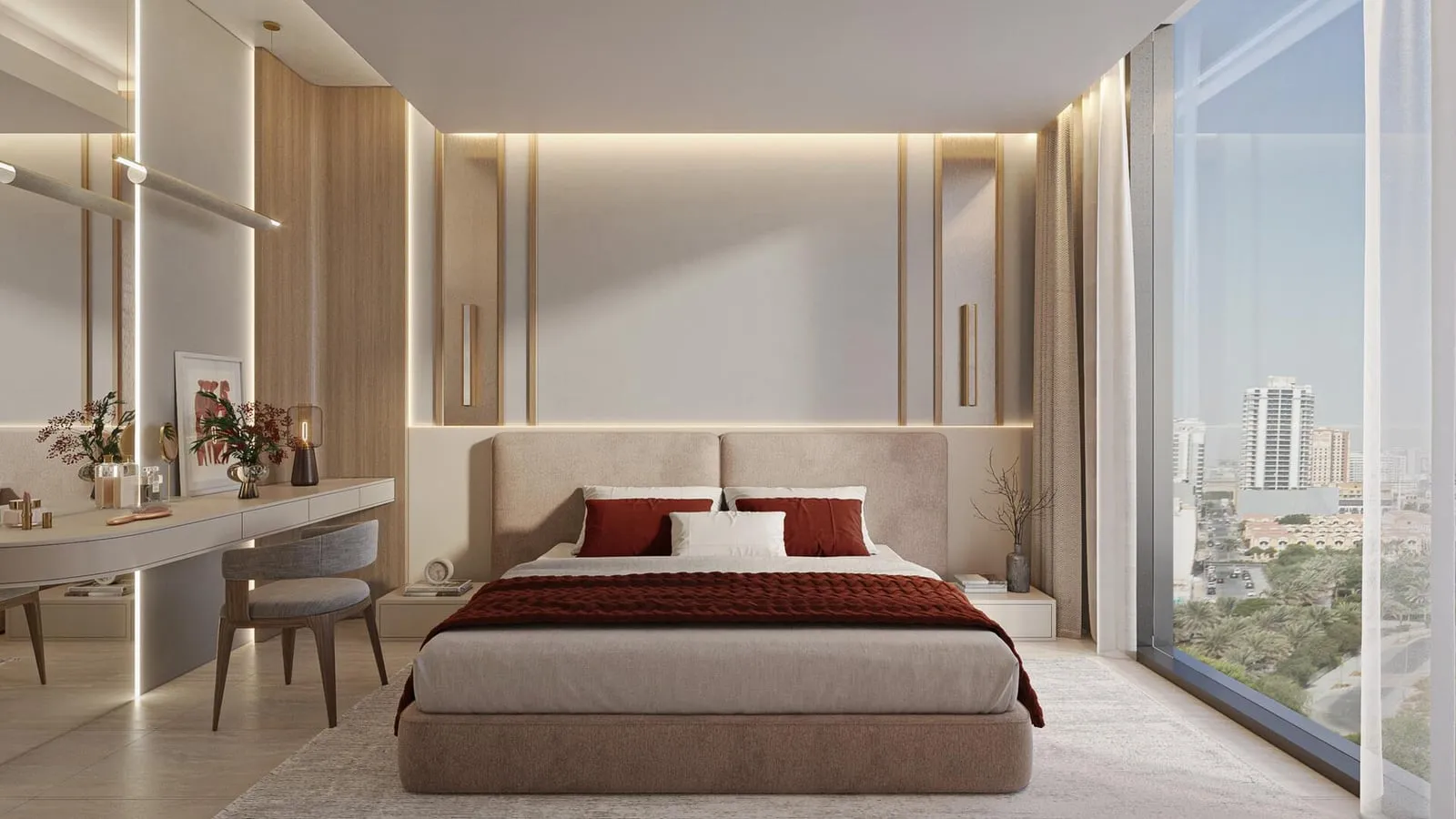 A bedroom with a bed dressed in burgundy linen and a desk beside the window