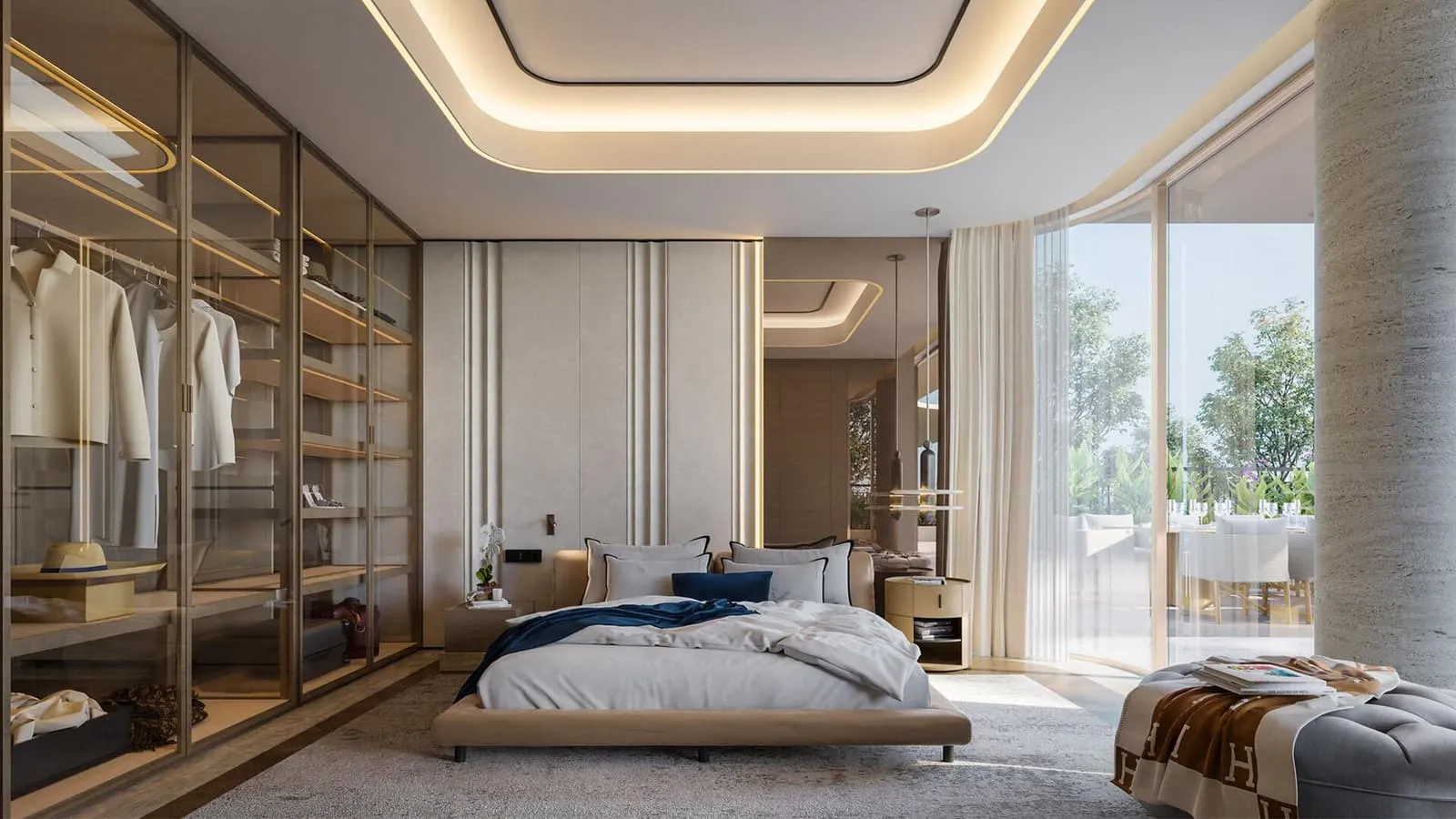 A bedroom with its dressing room open behind glass
