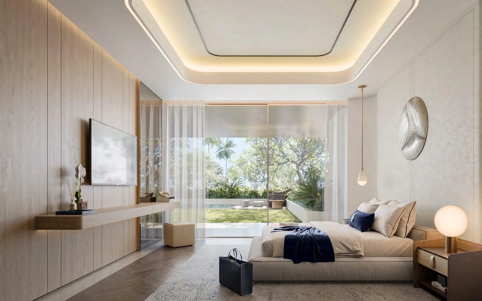 A bedroom looking onto the garden, low joinery along the wall