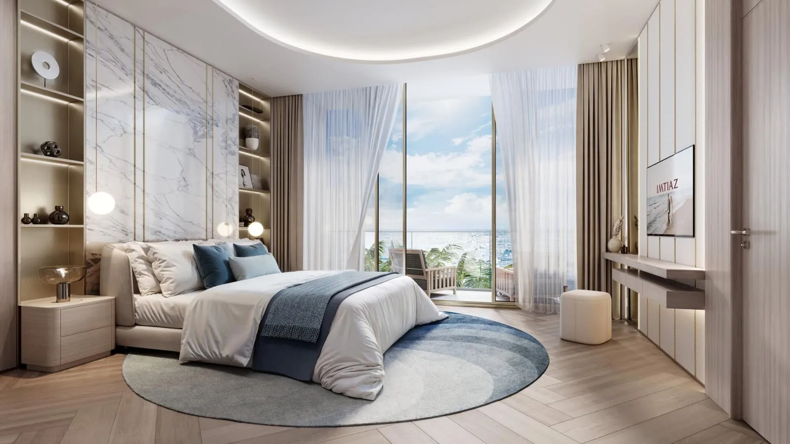 A bedroom with a round rug at the foot of the bed and a full height window filling one wall