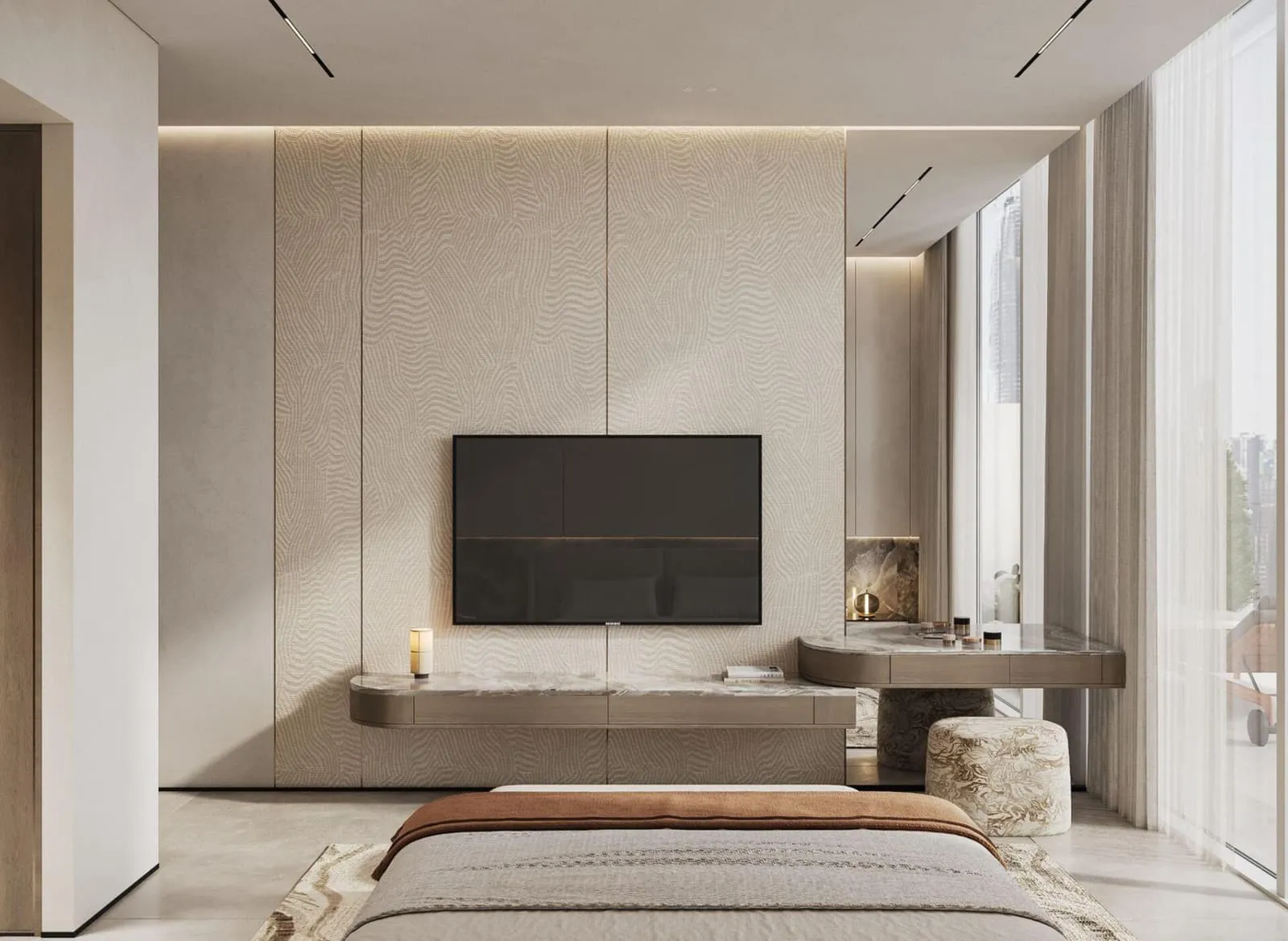 A bedroom with a wall-mounted television facing the bed across an open floor