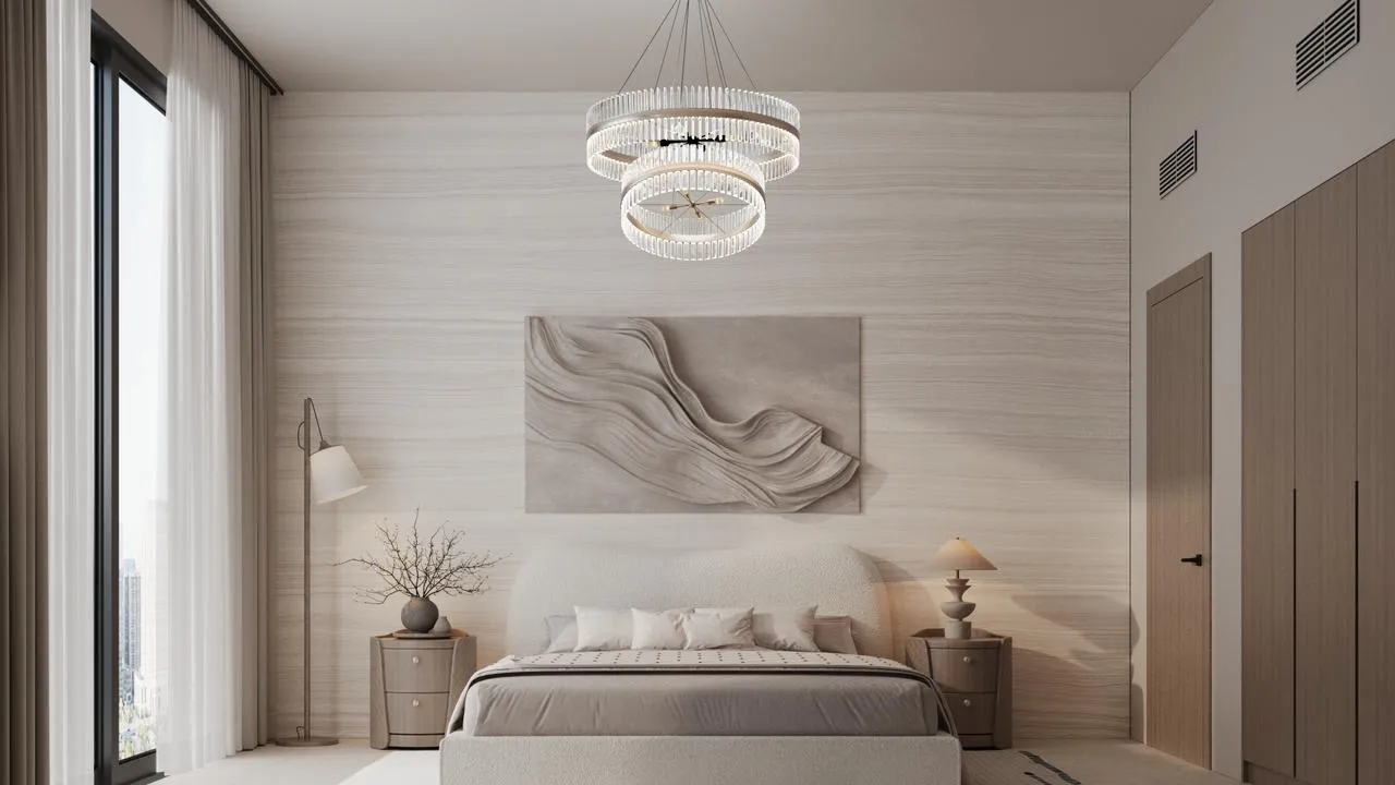A bedroom with an abstract wave canvas above the bed, matched bedside lamps and full height windows to the left