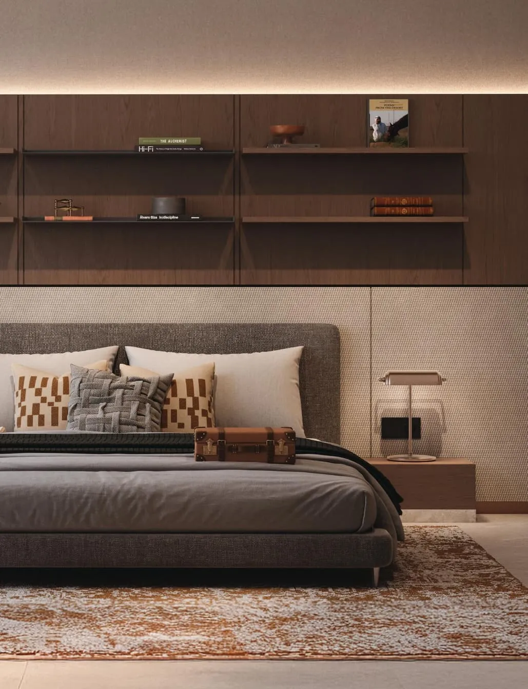A bedroom with dark timber shelving above the headboard and a woven panel behind the pillows