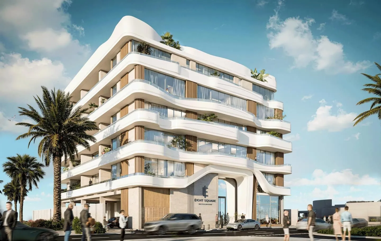 Daytime view of Nooré's sculpted white facade with wraparound balconies and lush palm landscaping