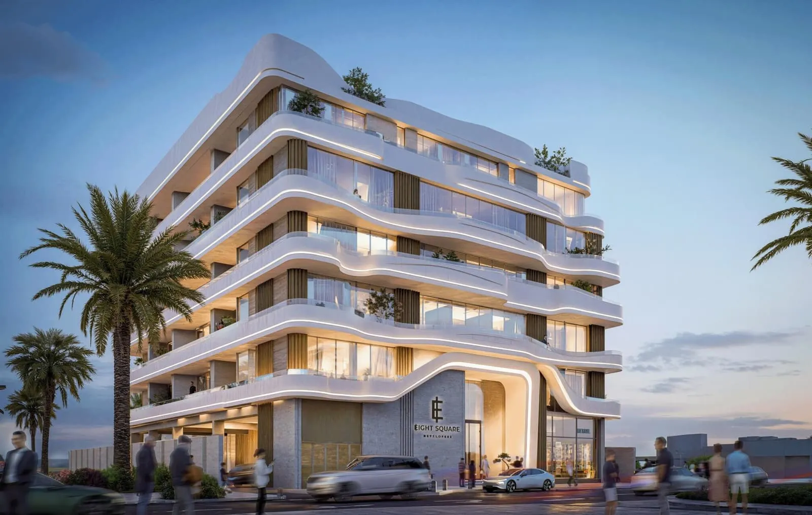 Nooré's curved white facade glowing at dusk, with palm trees and the Eight Square Developers entrance