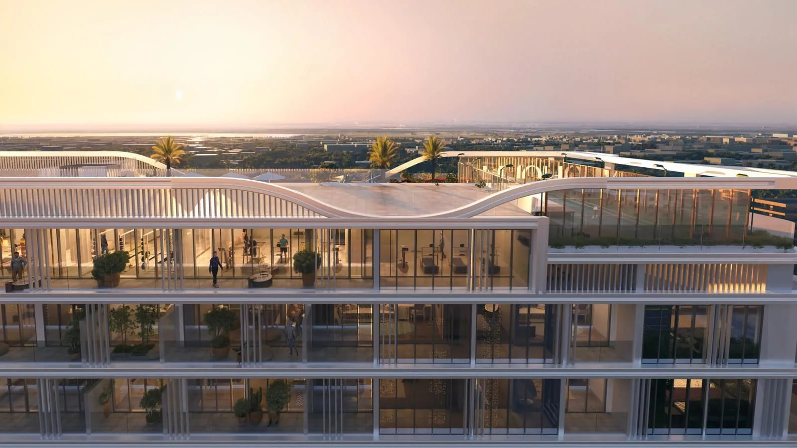 Low-rise wing of Linea by Holm captured at dusk with palm-lined landscaping.