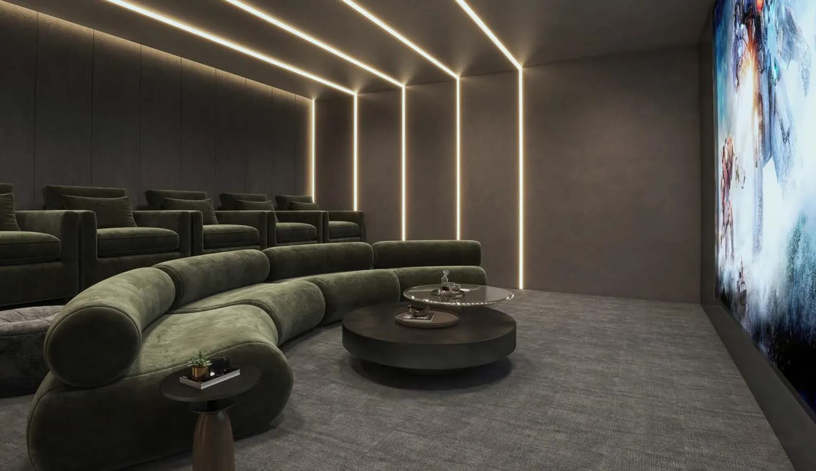 Private cinema lounge with tiered green sofa seating