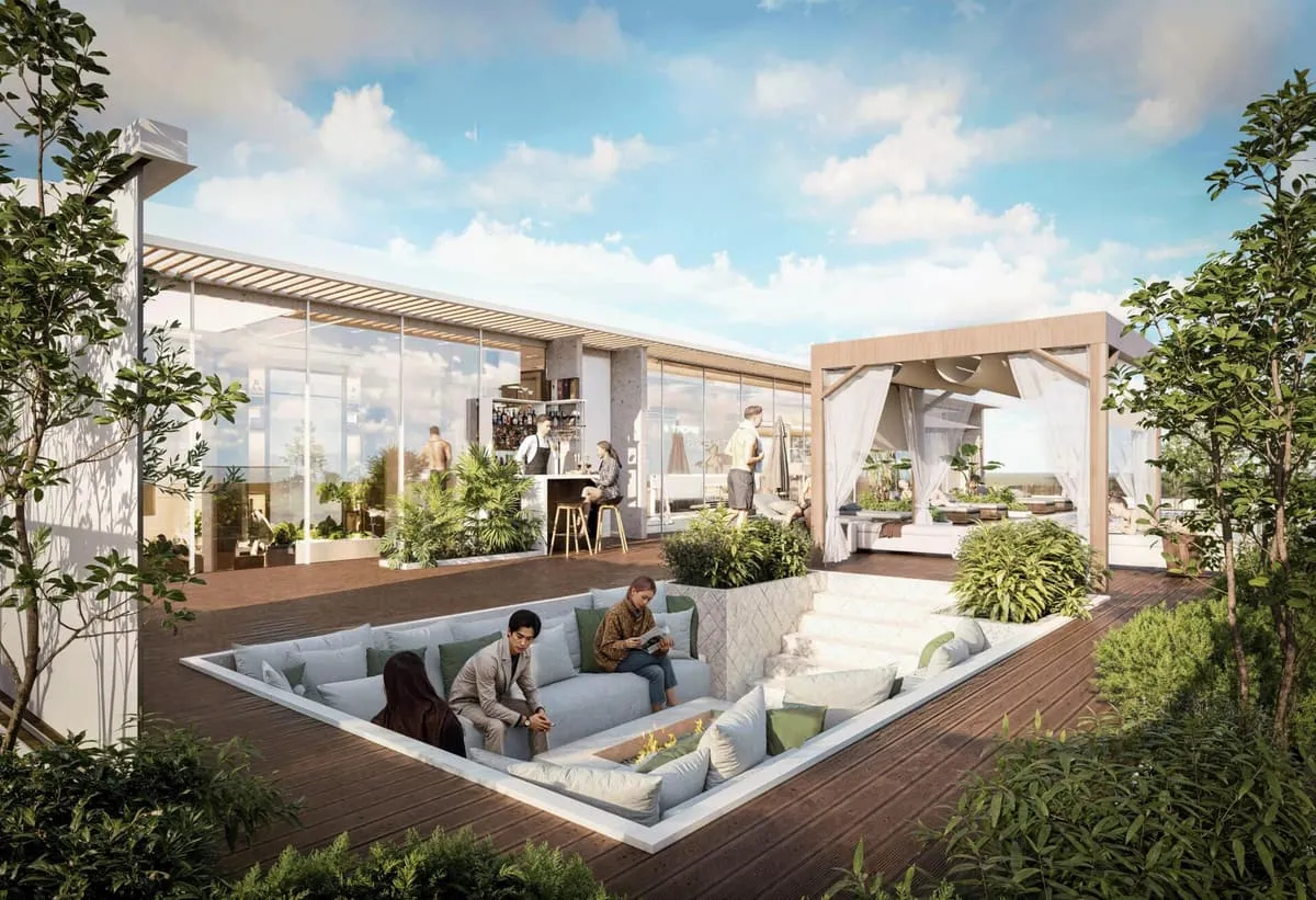 Landscaped courtyard lounge with sunken seating, pergolas and greenery at Nooré