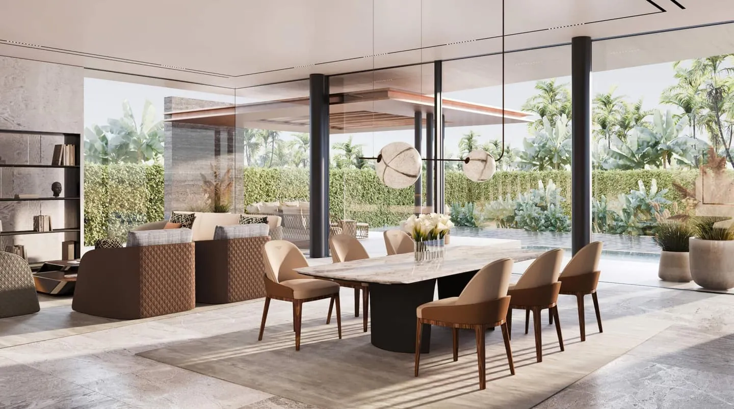 A Bentley Home dining room with brown leather chairs and the terrace beyond