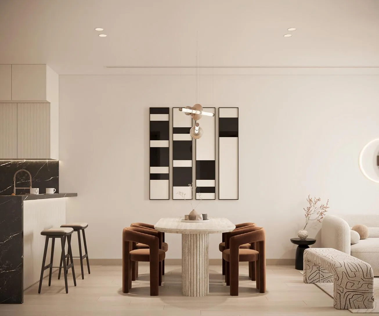 A dining corner with a round table and wooden chairs, opening onto the kitchen behind