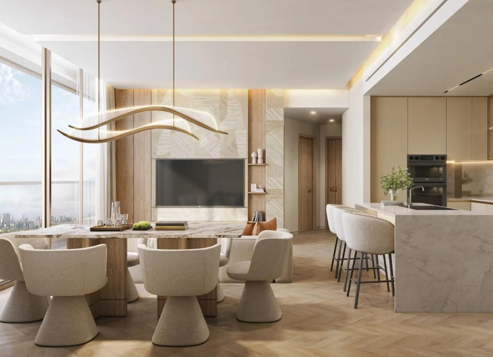 A dining table and open kitchen against full-height glass, with a wave-shaped light fitting above the table