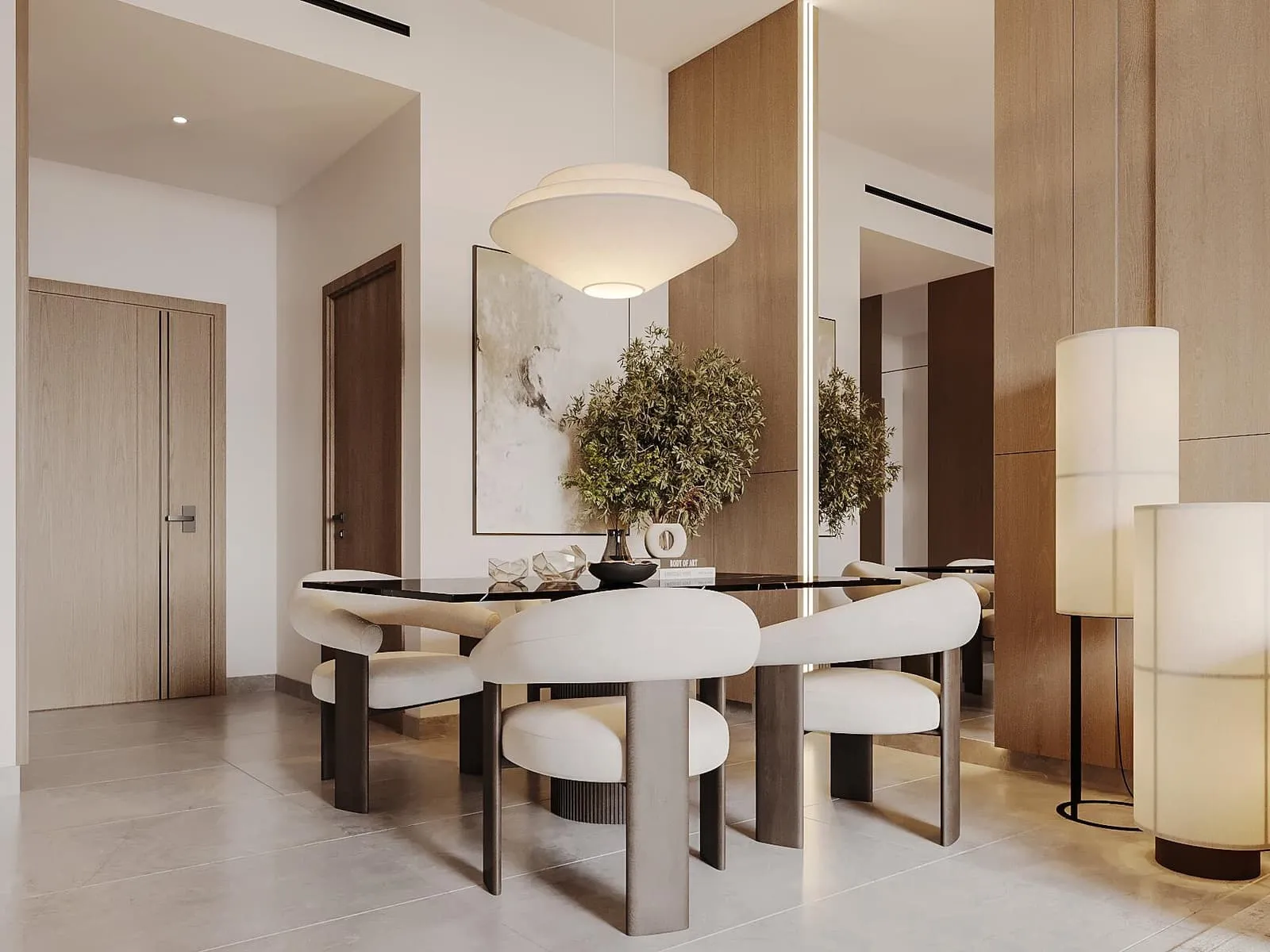 A dining corner, four upholstered chairs around a round table under a globe pendant