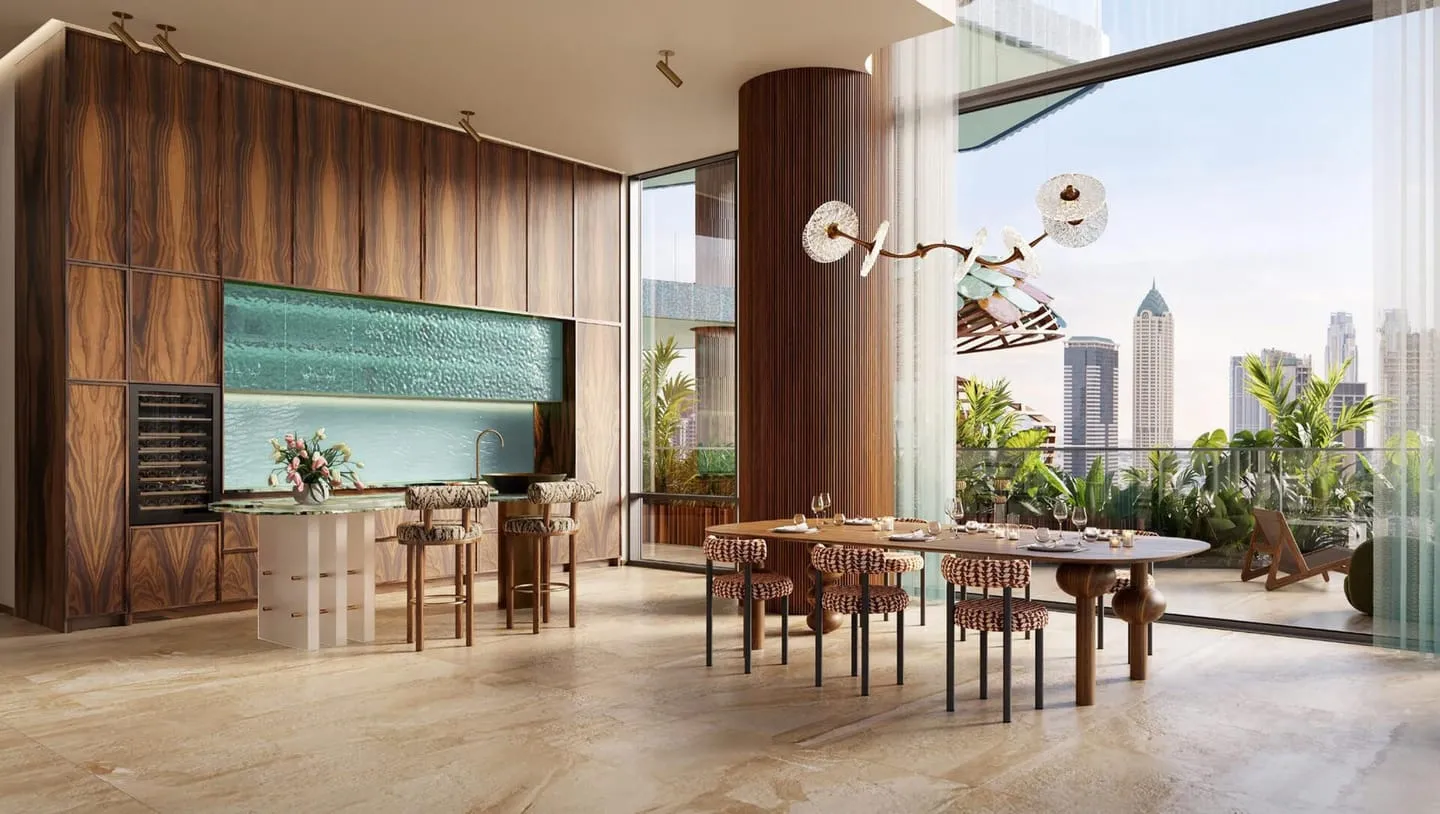 A long dining table in front of a backlit teal glass wall, a round timber column standing at one end