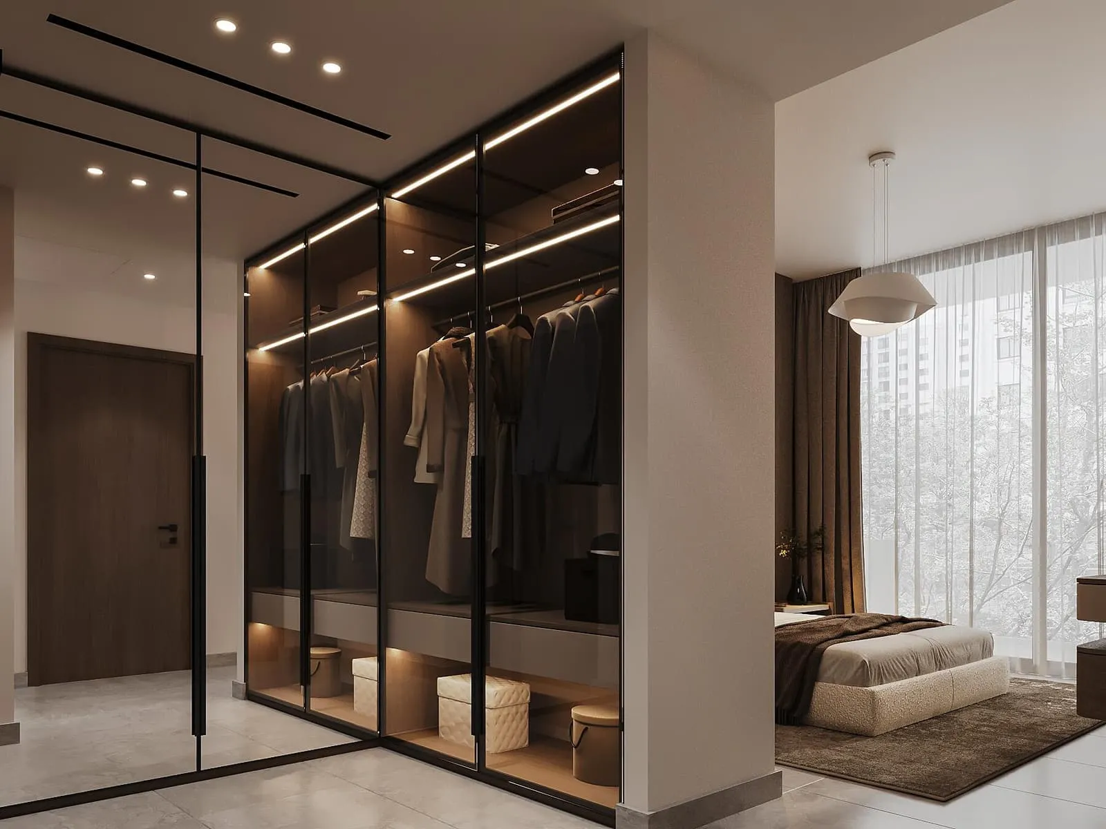 A dressing room behind glazed doors, hanging rails lit from within the joinery