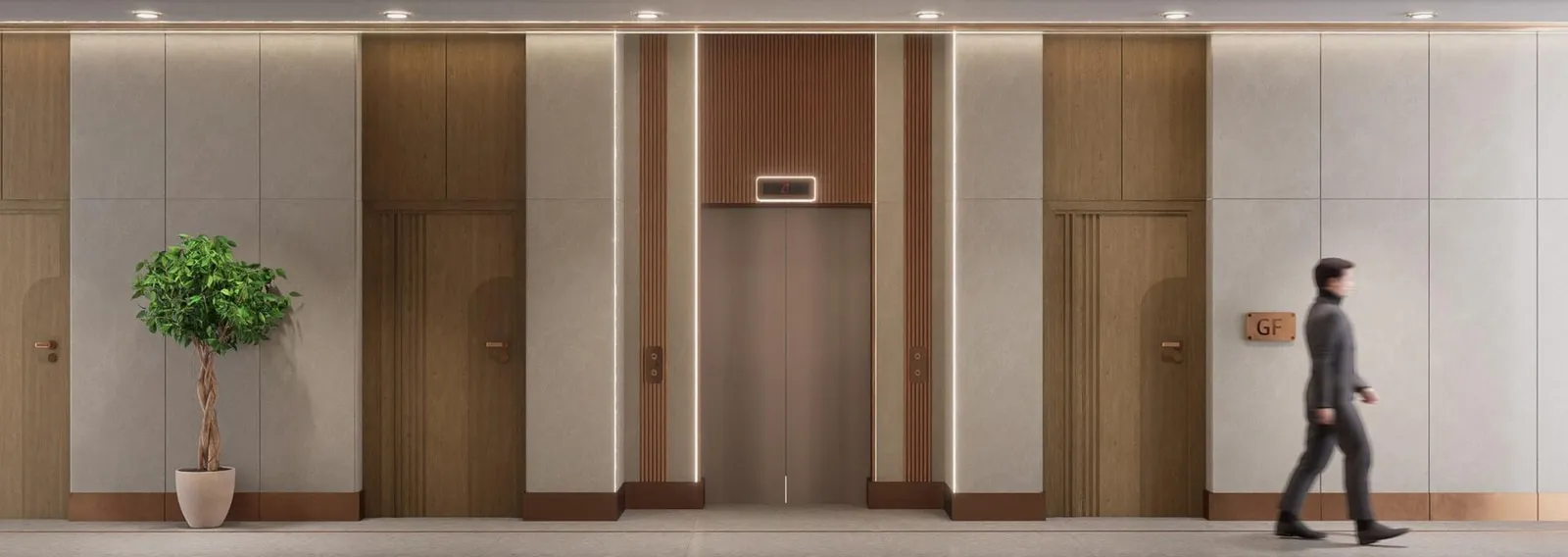A wood-paneled corridor leading to the elevator lobby
