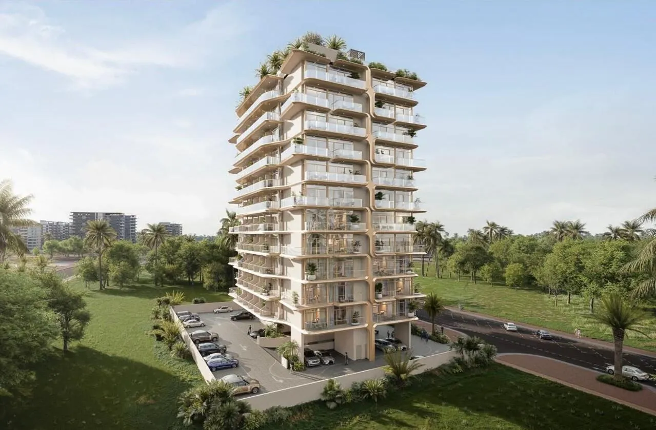 Izel by Zoya from above, rounded balcony slabs with planting on every level and cars in the parking court below