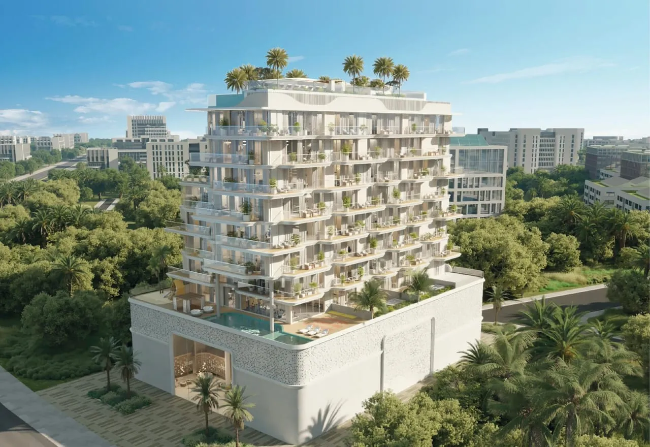 Meriden Beach Residences by day, its stepped white terraces planted with greenery above a landscaped podium