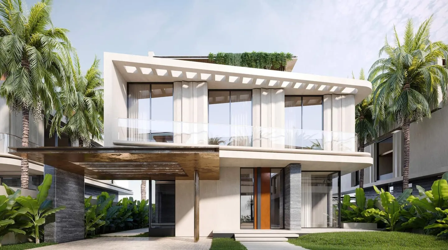 The entrance of a Bentley Home villa under cantilevered terraces planted with greenery