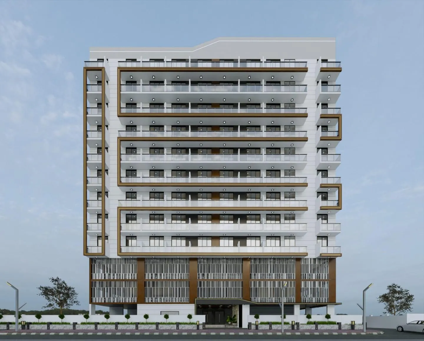 The tower seen head on against a blue sky, bronze balcony frames banded across a white facade above a slatted podium