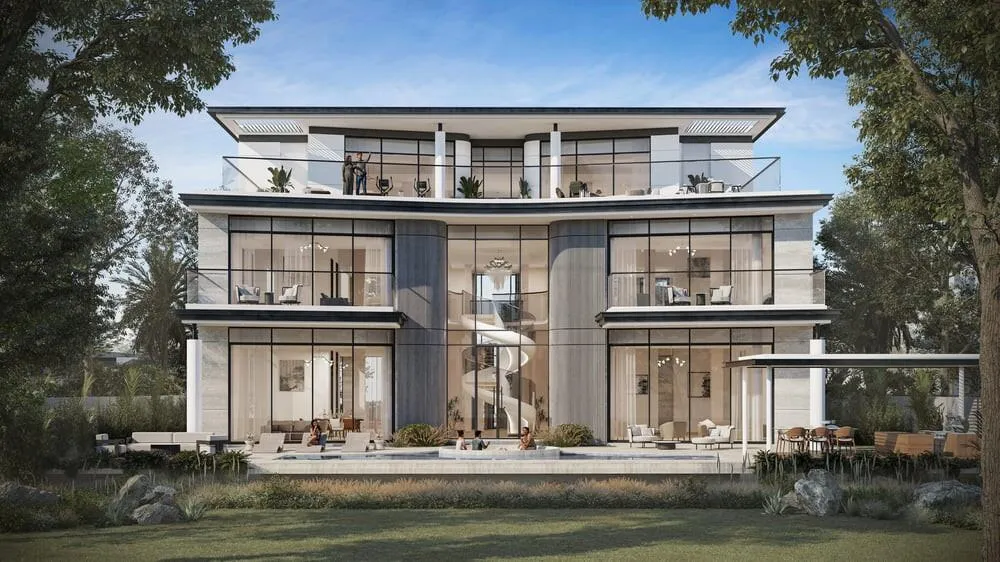 A Karl Lagerfeld villa seen across its lawn, full-height glazing along the ground floor