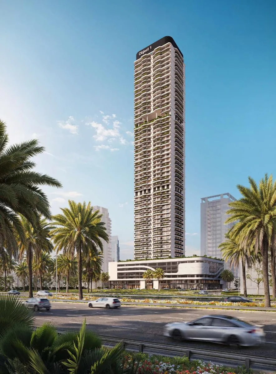 The building seen whole from the road, its curved balcony bands stacked the full height