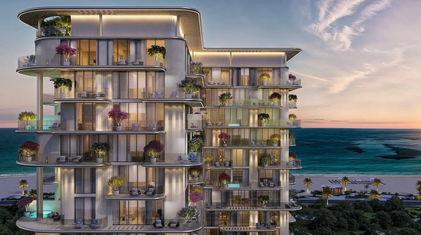 A close view of the corner terraces, each glazed level planted with bougainvillea and opening to the sea