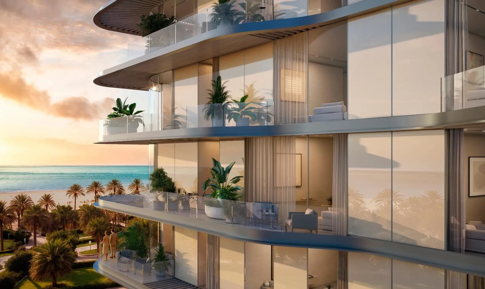 A close view of the curved balconies with their planters and glass balustrades, the sea beyond at golden hour