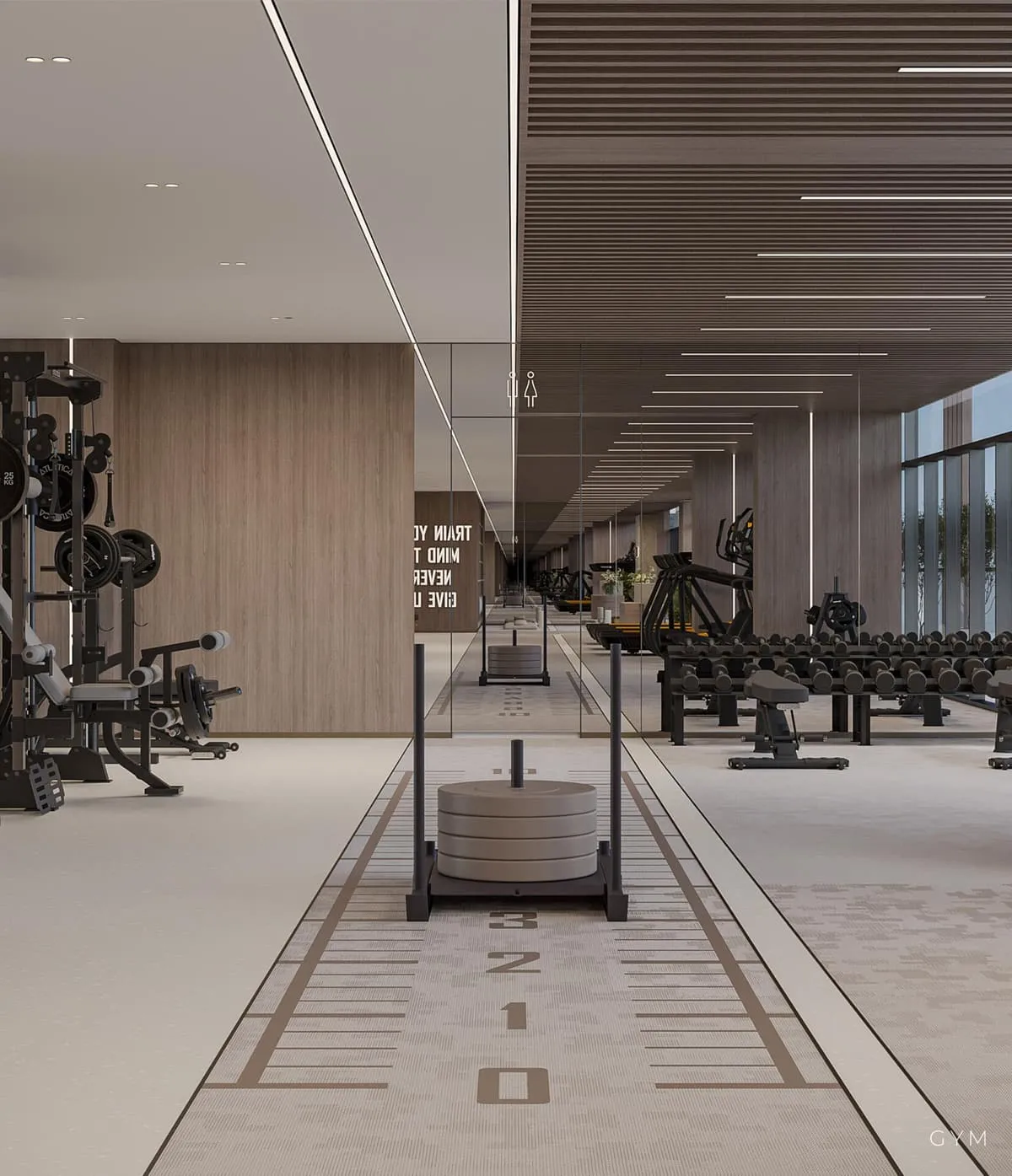 Spacious fitness hall with strength training equipment at Linea by Holm.