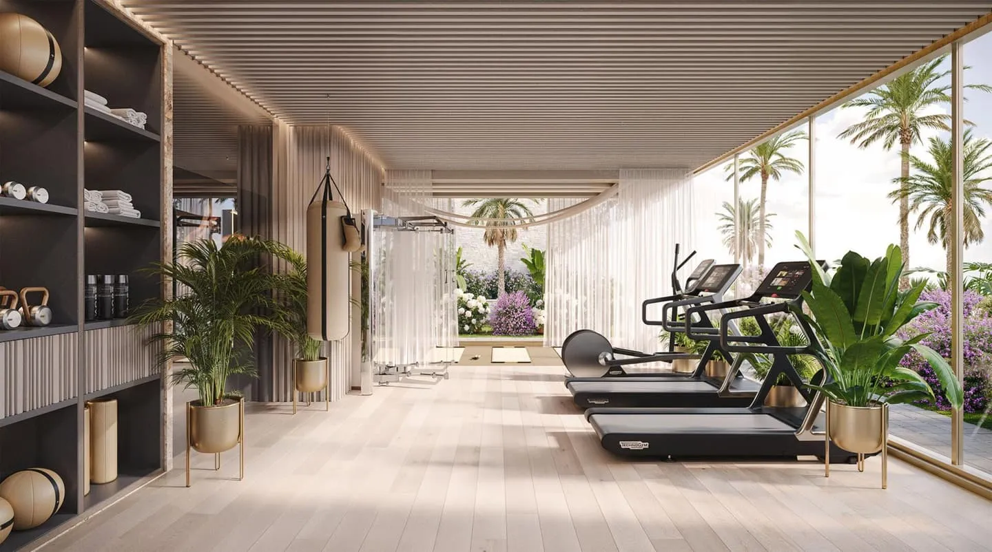 Fitness centre with a long training corridor lined with greenery.