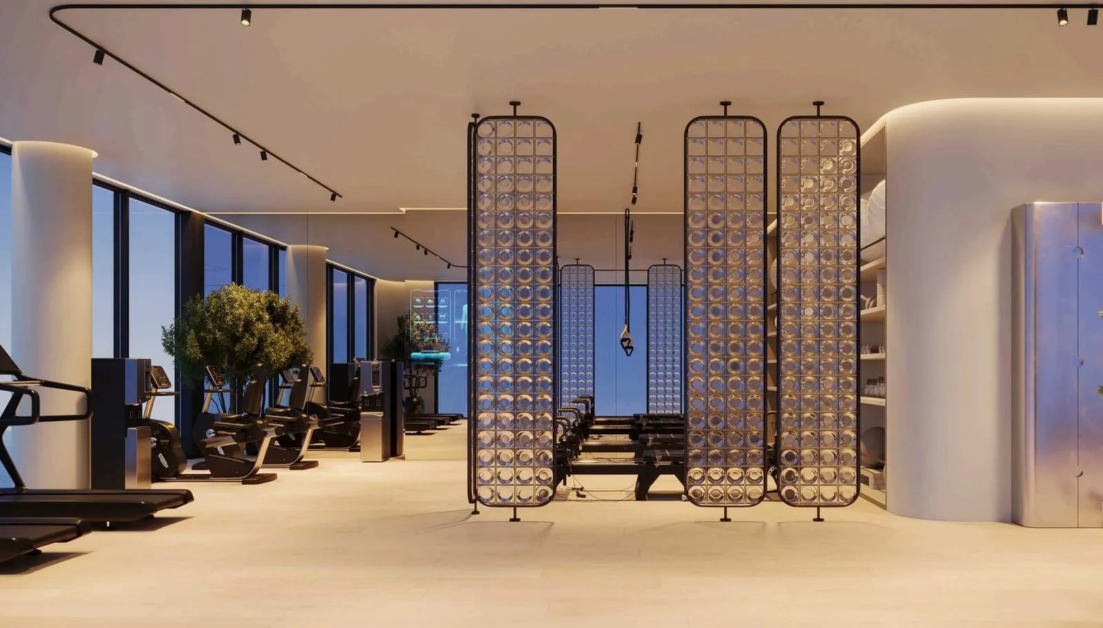 The main gym hall, weight stations set between tall gilded filigree screens under a curved white ceiling