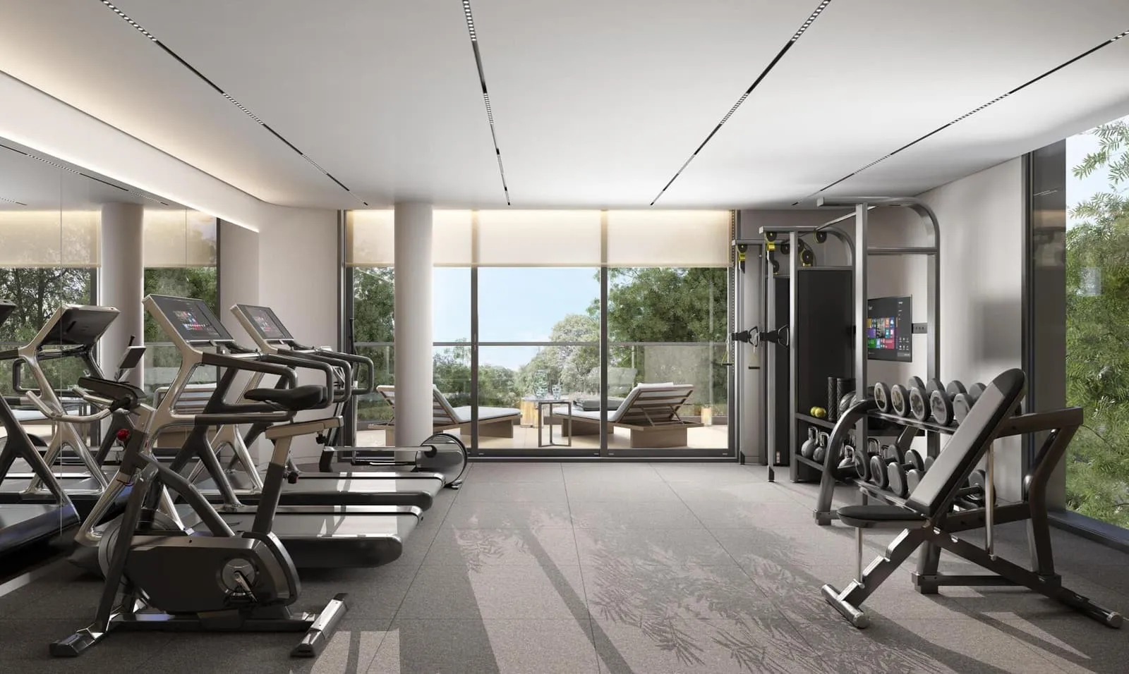 The Karl Lagerfeld gym with treadmills and weight machines along the glazed wall