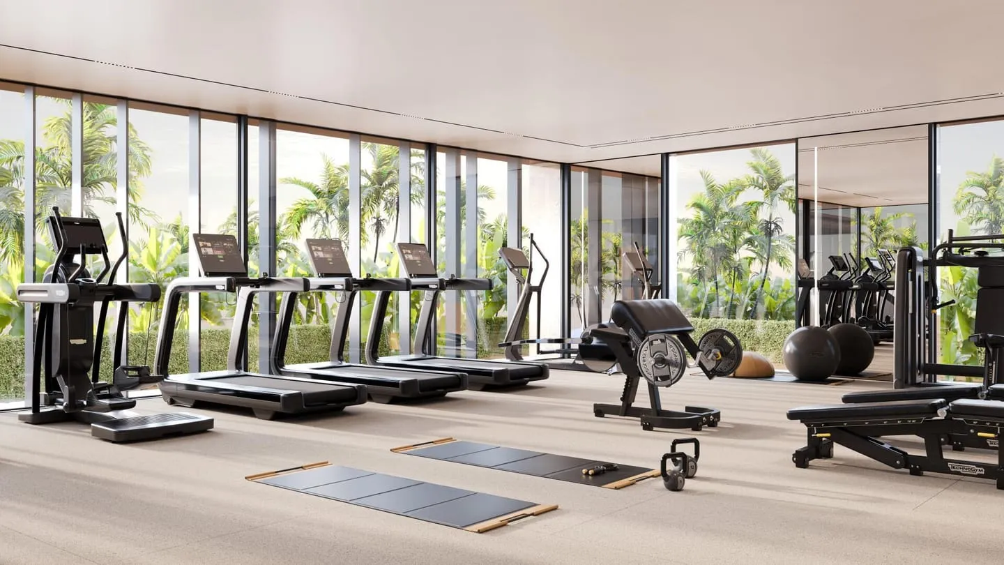 The Bentley Home gym with treadmills and weight machines along the glazed wall