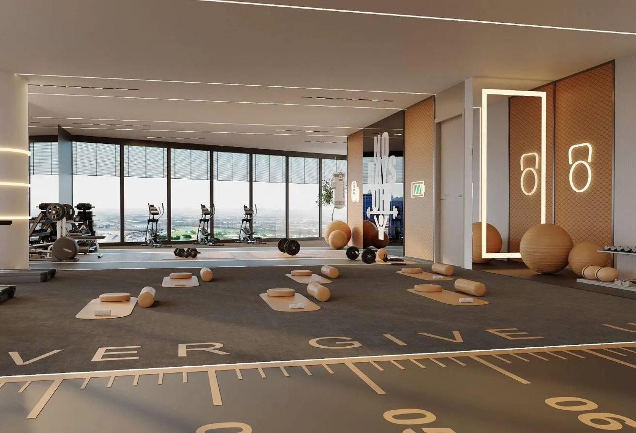 Render of the gym, with floor-to-ceiling windows and training equipment