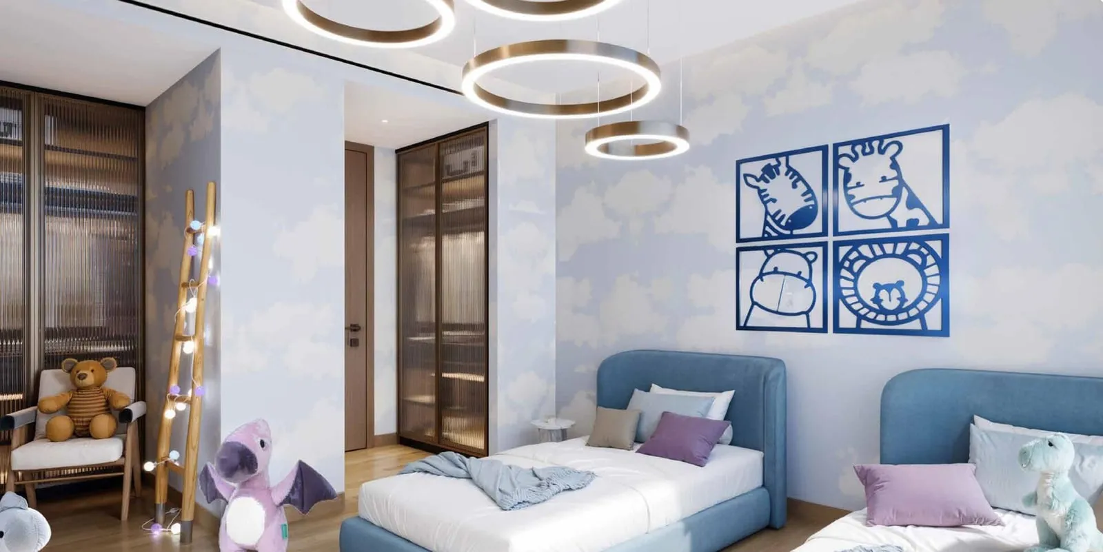 A children's bedroom with cloud-painted walls, a blue bed frame and framed bear prints above the pillows