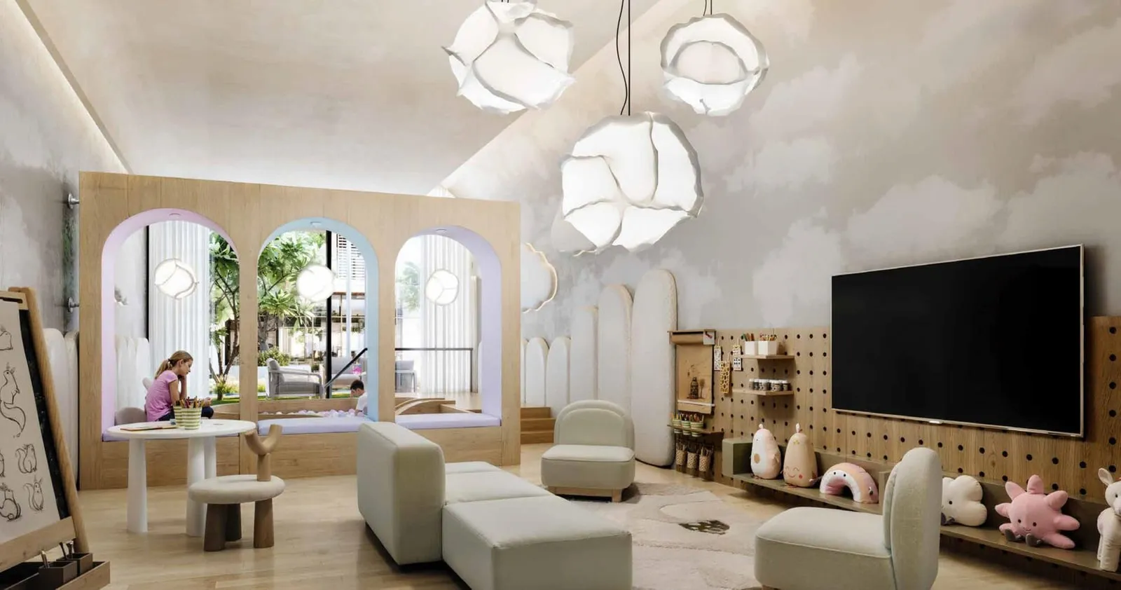 The kids club, small chairs and cloud pendants around a screen with an arched alcove at the back
