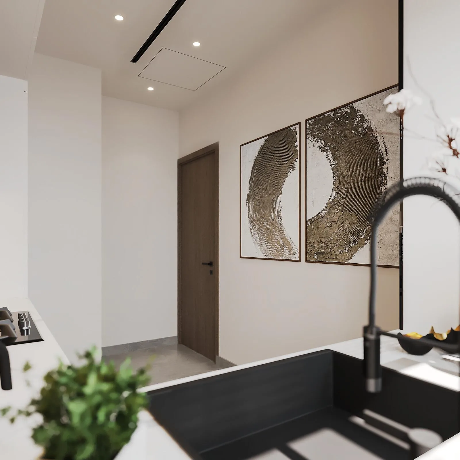 A kitchen island with an undermounted sink and a black gooseneck tap