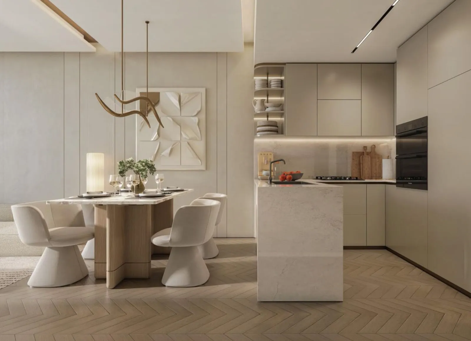 The open kitchen from the dining table, a stone island end and a sculptural light hanging over herringbone flooring