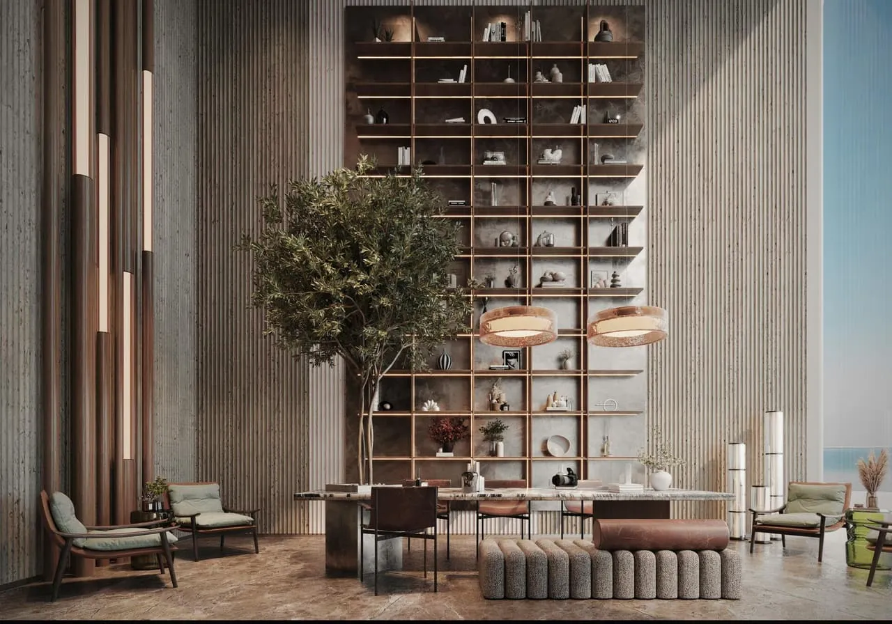 An indoor tree in front of the tall bookcase, armchairs and a ribbed stool grouped around its base