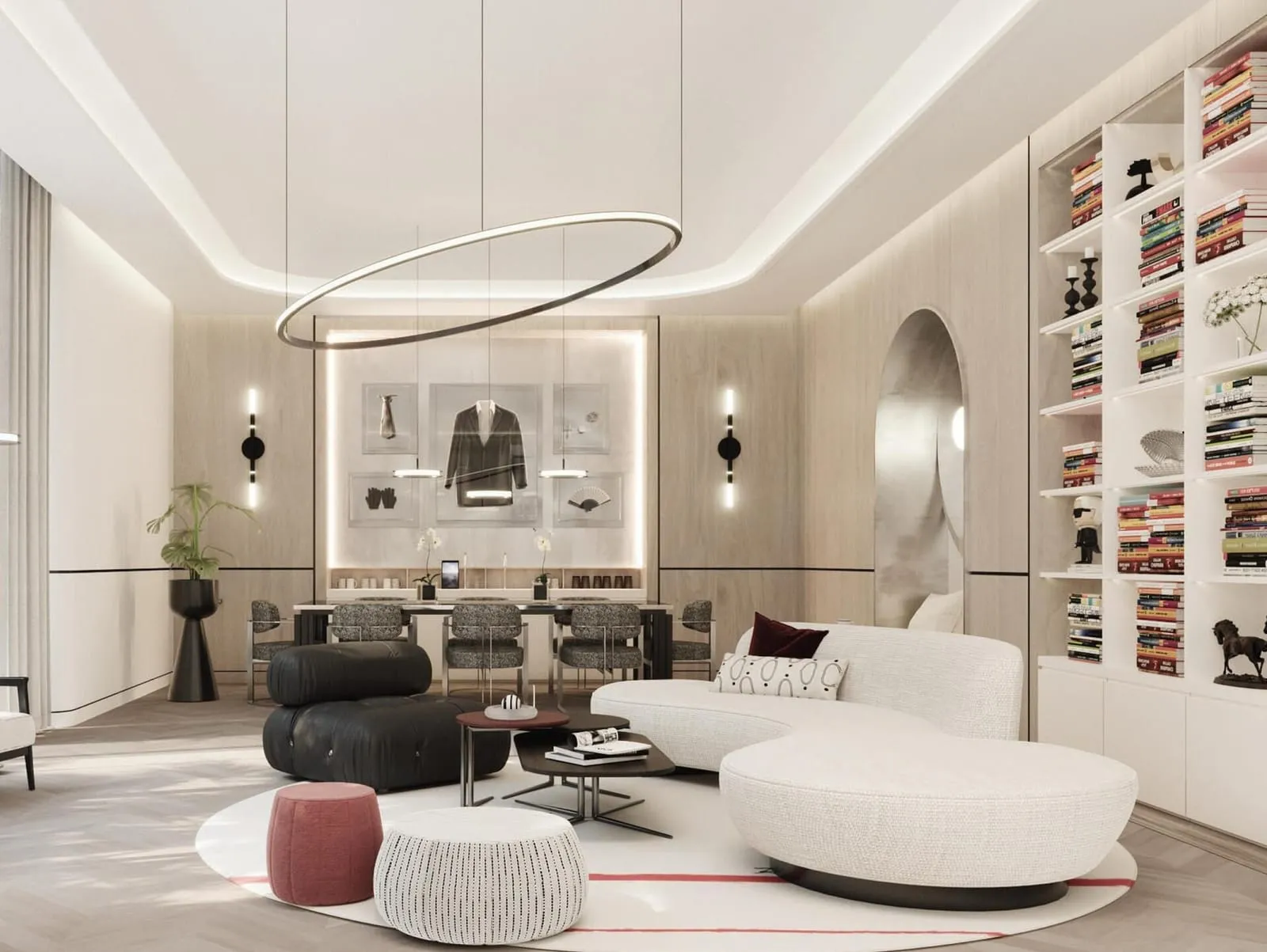 A Karl Lagerfeld living room with a circular light over curved sofas and a wall of books