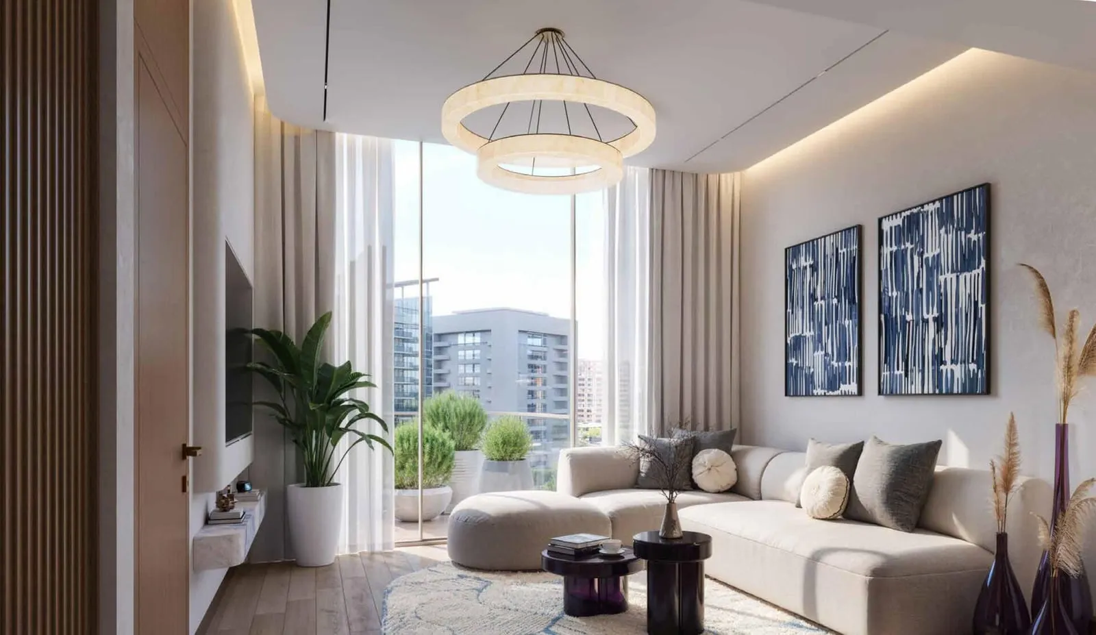 A living room under a ring chandelier, sheer curtains at full height glass and blue panels on the far wall