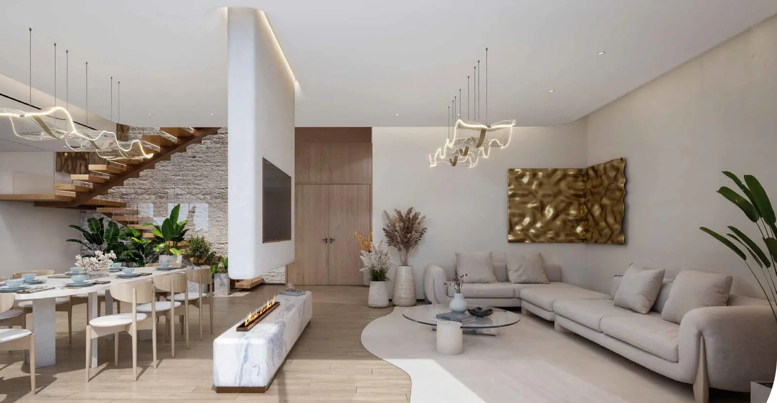 A living room with the duplex stair rising behind the sofa, the dining table beyond and a gold relief on the wall
