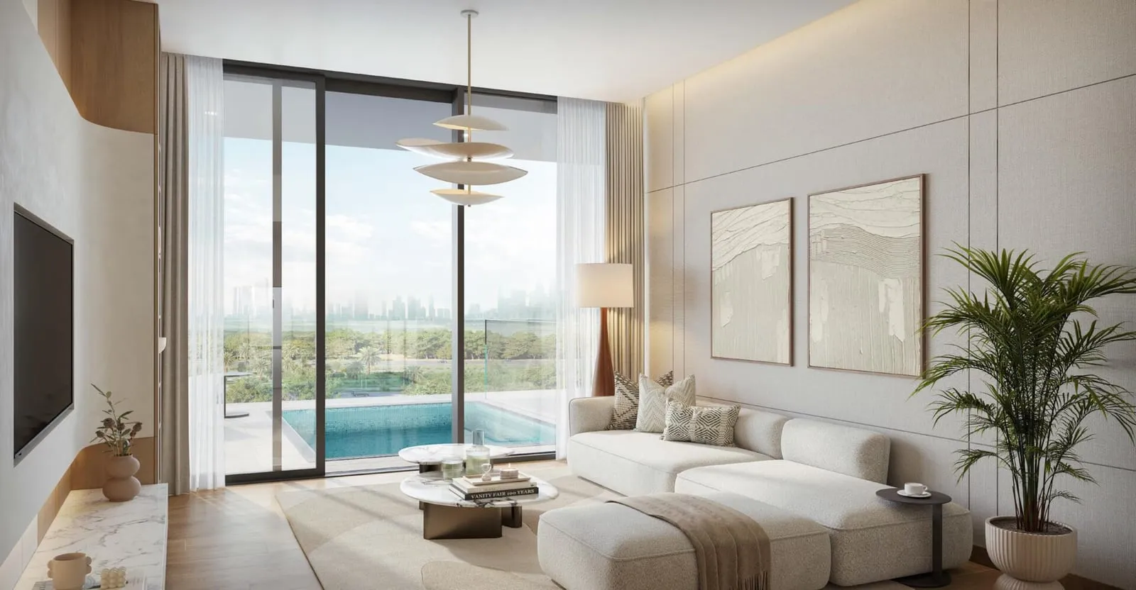 A living room with a sectional sofa and sliding glazing opening onto a terrace with a private pool